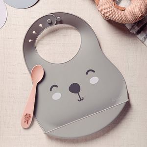 Set Babero Gris y Cuchara Rosado Le Petit - Tramontina