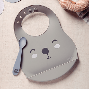 Set Babero Gris y Cuchara Gris Le Petit - Tramontina